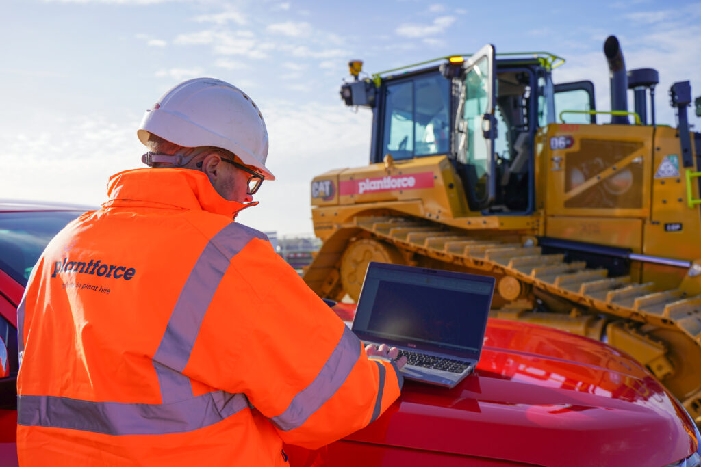 Plantforce Worker on Site Using a Laptop