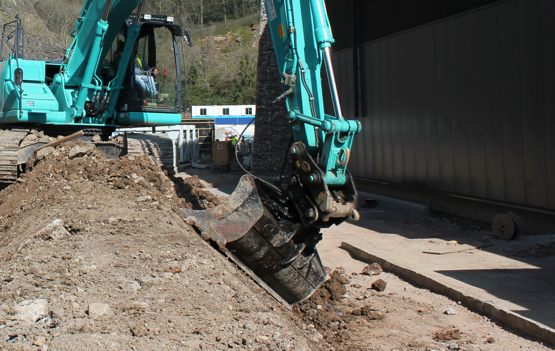 Plantforce Tilt Bucket Attachment Operating On Site